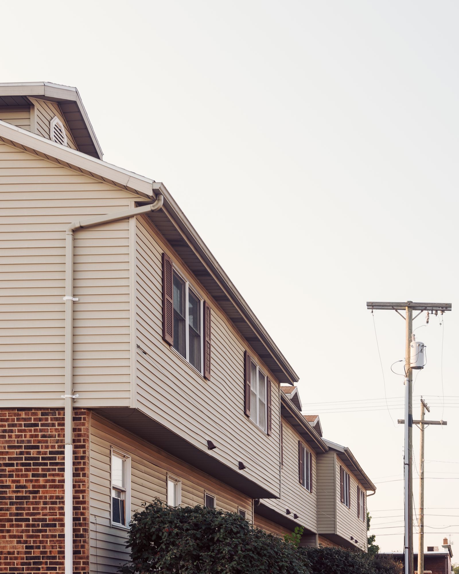 Representative after state - calm suburban homes with intact roofs