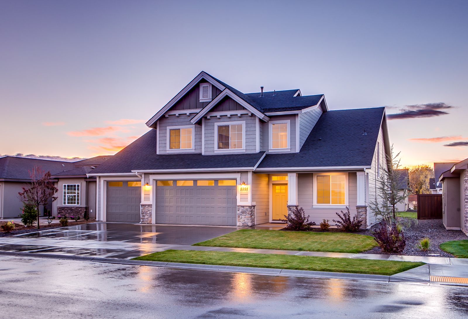 Representative after state - well-kept house with a sound roof at twilight